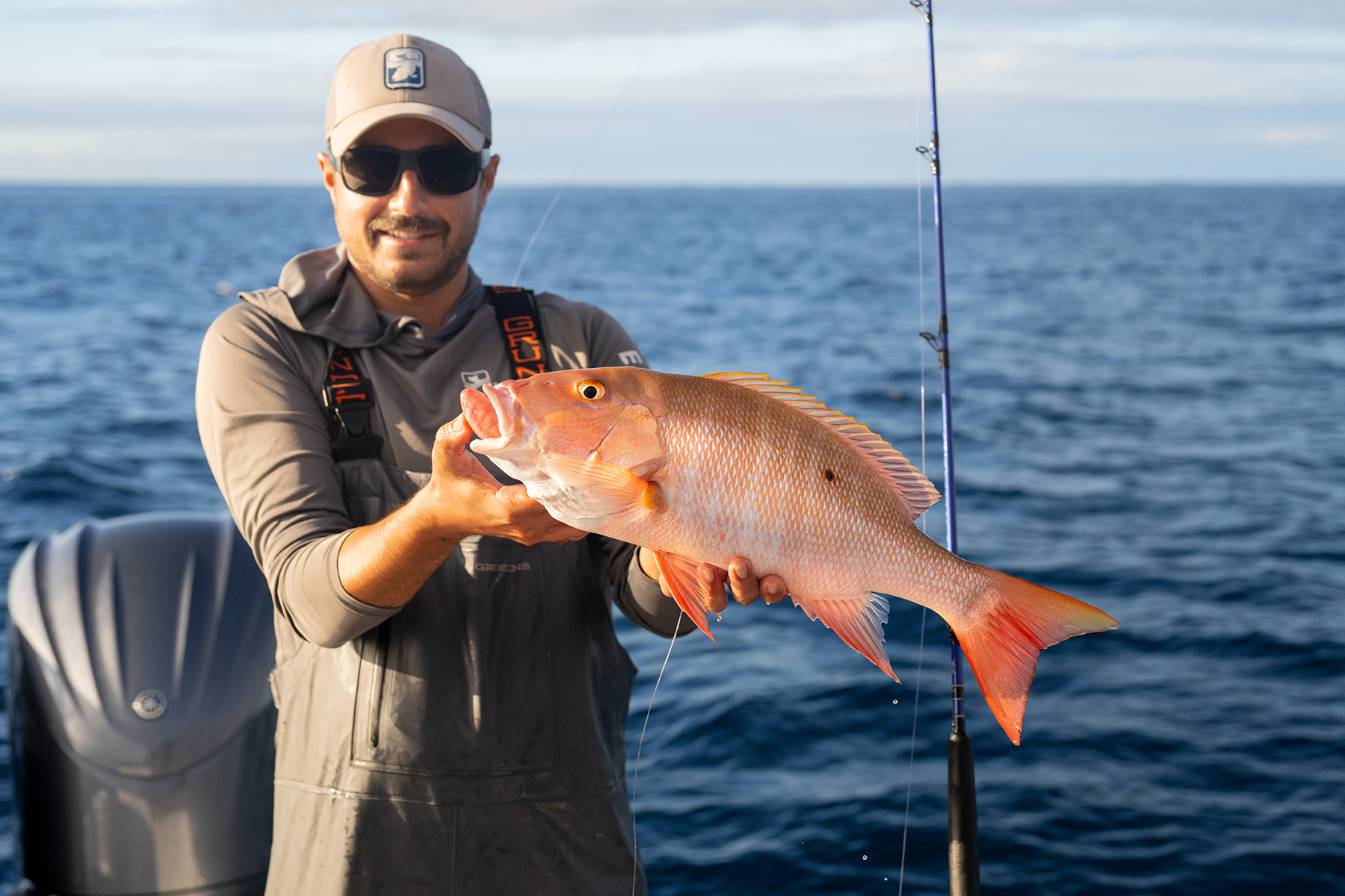 An angler holding a Mutton snapper.